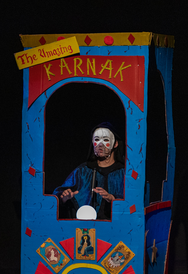 Bennie Randolph sits in a booth. Randolph played Karnak, a fortune teller who knew when people would die.