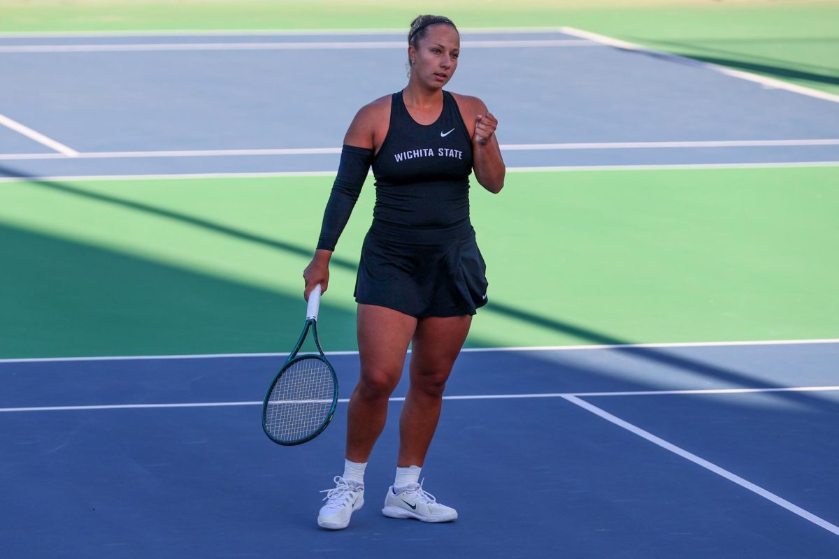 Wichita State women's tennis junior Kristina Kudryavtseva fist pumps during her singles match against South Florida March 27 at the Sheldon Coleman Tennis Complex. Kudryavtseva's singles match was left unfinished, as the Shockers swept the Bulls.