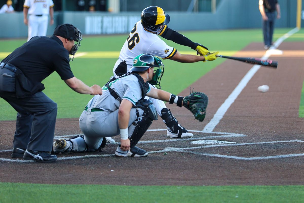 Wichita State baseball junior outfielder Kaleb Duncan (26) takes a hack against Charlotte on March 20 at Eck Stadium. Duncan struck out twice in the Shockers' 8-3 win.