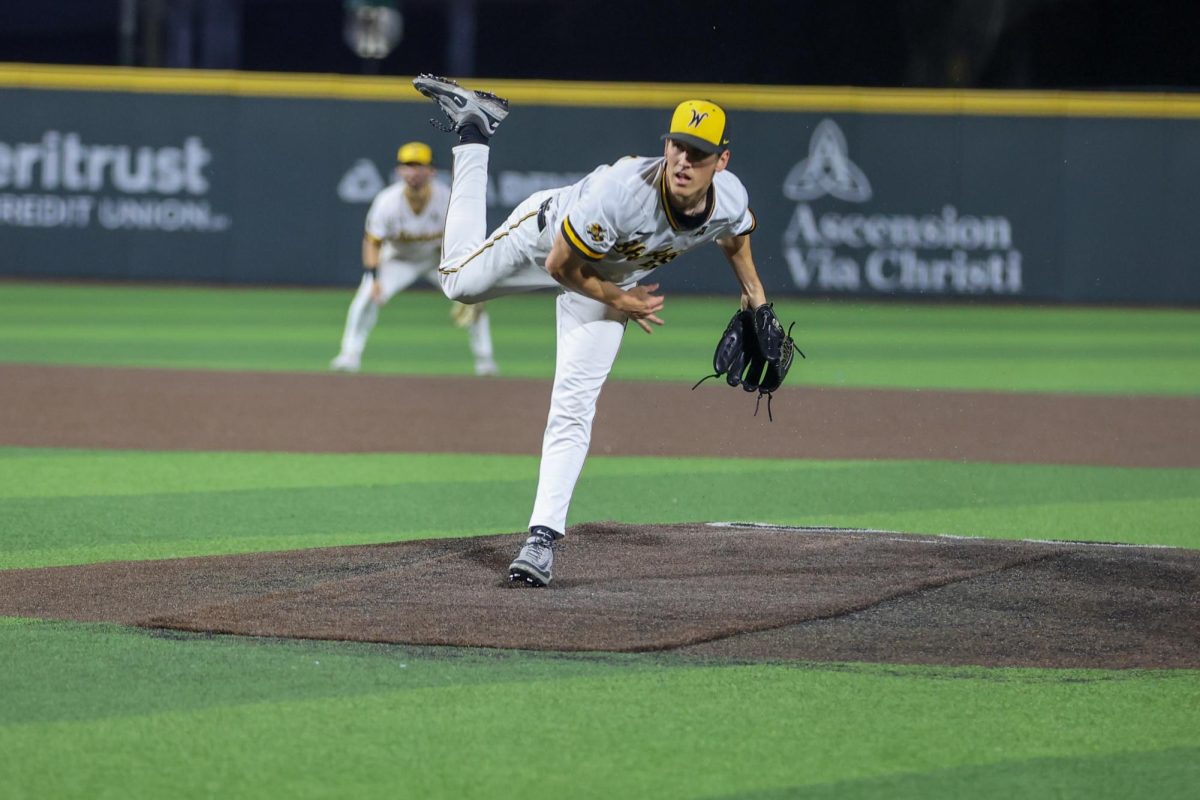 Wichita State baseball graduate pitcher Brady Pacha (45) fires one to home plate against Charlotte on March 20 at Eck Stadium. Pacha earned his second save on the mound this season after four innings of one-run ball.