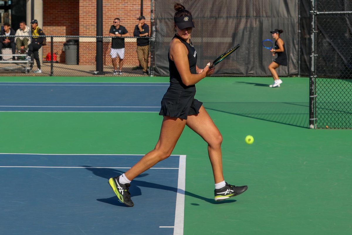 Wichita State women's tennis senior Theodora Chantava watches a ball go out of bounds against South Florida March 27 at the Sheldon Coleman Tennis Complex. Chantava won her singles and doubles matches.