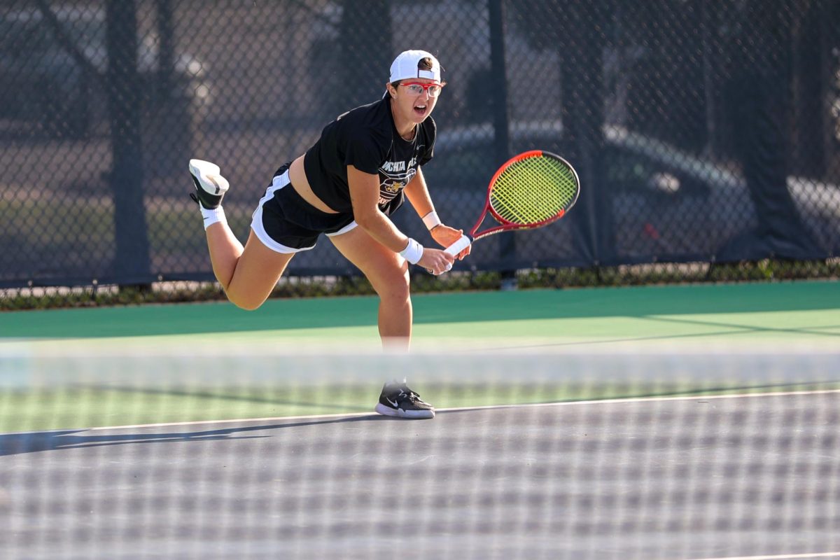 Wichita State women's tennis junior Giorgia Roselli follows through with a shot against South Florida March 27 at the Sheldon Coleman Tennis Complex. Roselli is a part of the No. 17 doubles duo with junior Xin Tong Wang.