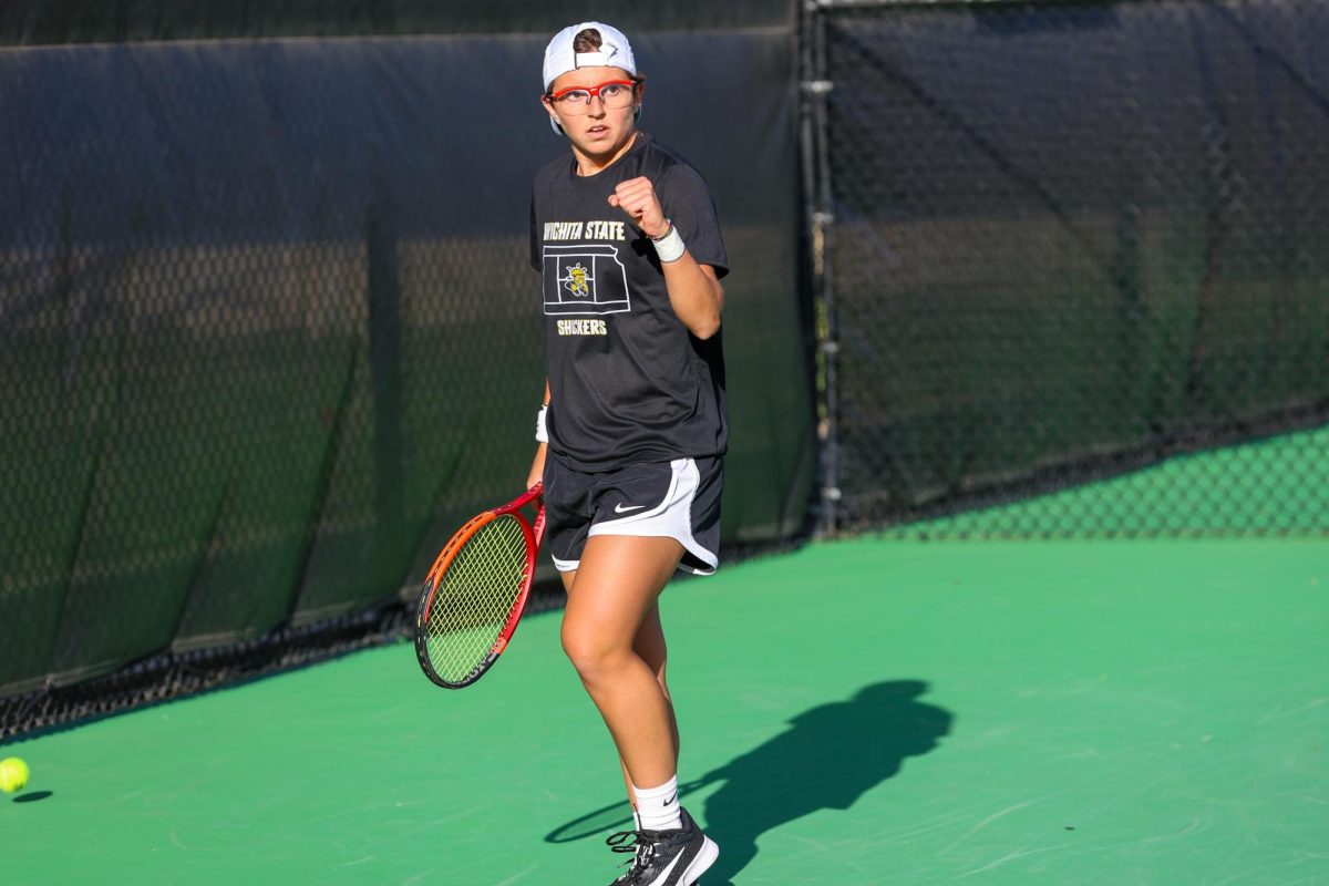 Wichita State women's tennis junior Giorgia Roselli fist pumps during a match against South Florida March 27 at the Sheldon Coleman Tennis Complex. The Shockers swept the Bulls for their 13th-staight win.