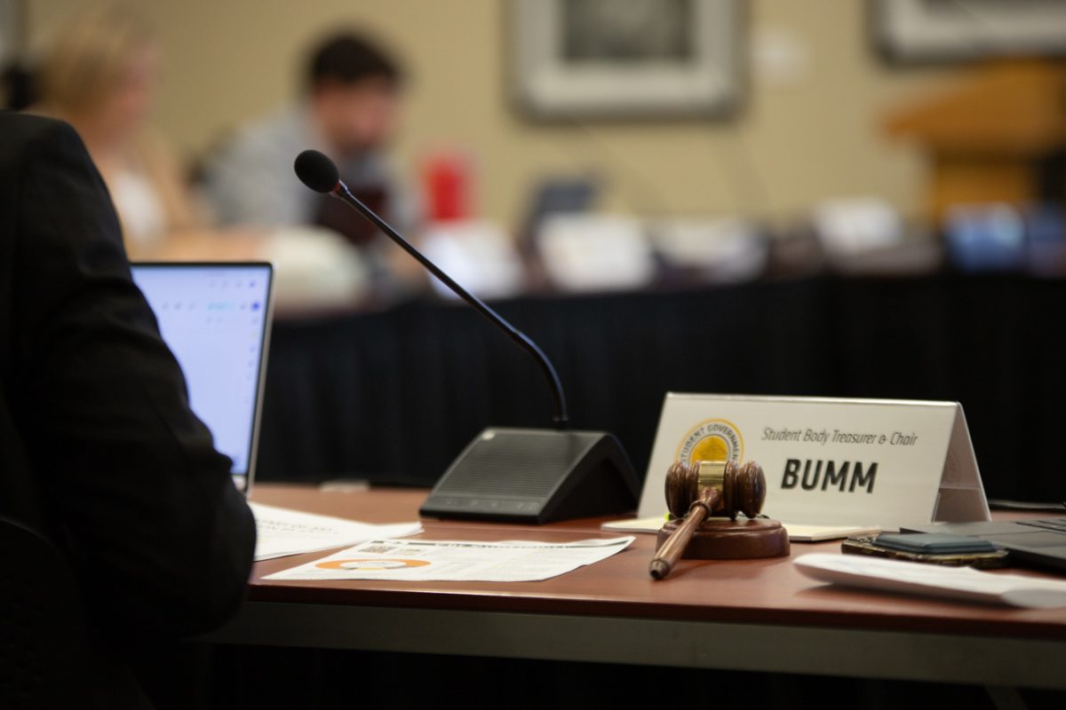 The student body treasurer and student fees commission chair's gavel rests during the student fees hearings. (File photo) 