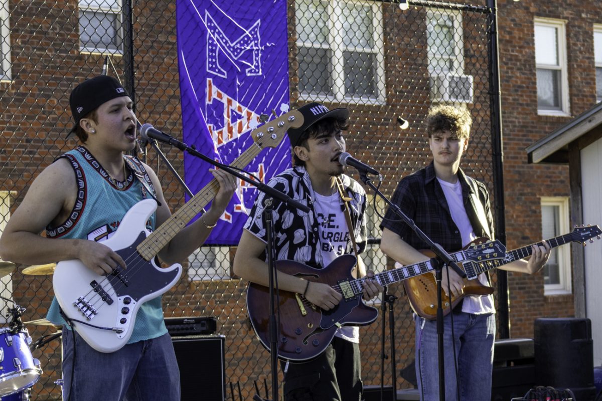 Local band Niffy performs at the Paddy Palooza at the SAE house. Niffy is an indie band in Wichita with four members.