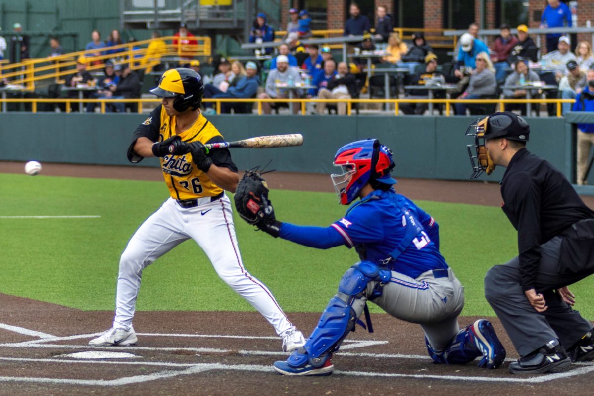 Wichita State baseball redshirt junior catcher Dominic Archila (36) takes a pitch against No. 11 Kansas on April 28 at Eck Stadium. Archila hit 1-for-4 against the Jayhawks.