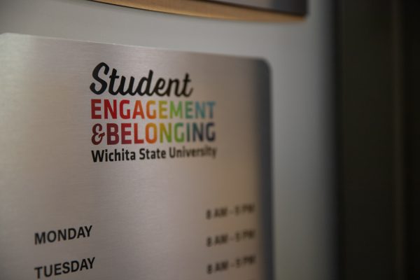 The sign to the Student Engagement and Belonging office on the second floor of the Rhatigan Student Center.