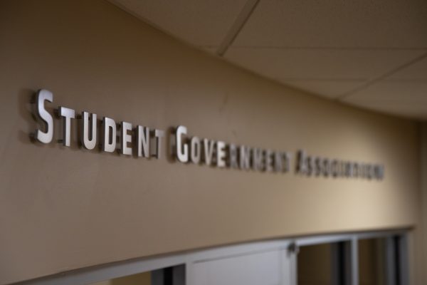 The Student Government Association's sign above its office. The SGA office is on the second floor of the Rhatigan Student Center.