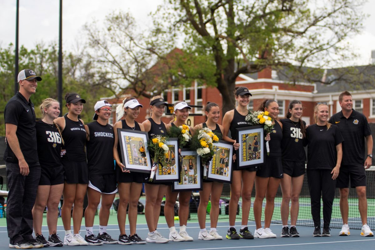 The Wichita State women's tennis team poses for a photo with the graduating class on senior day on April 11 at the Sheldon Coleman Tennis Complex. Five Shockers are in their last season at WSU.
