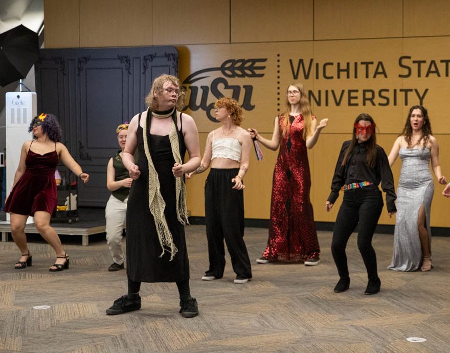 A group of students dance together at the annual Pride Prom hosted by Spectrum on April 17. This year’s theme was “Masquerade.” 