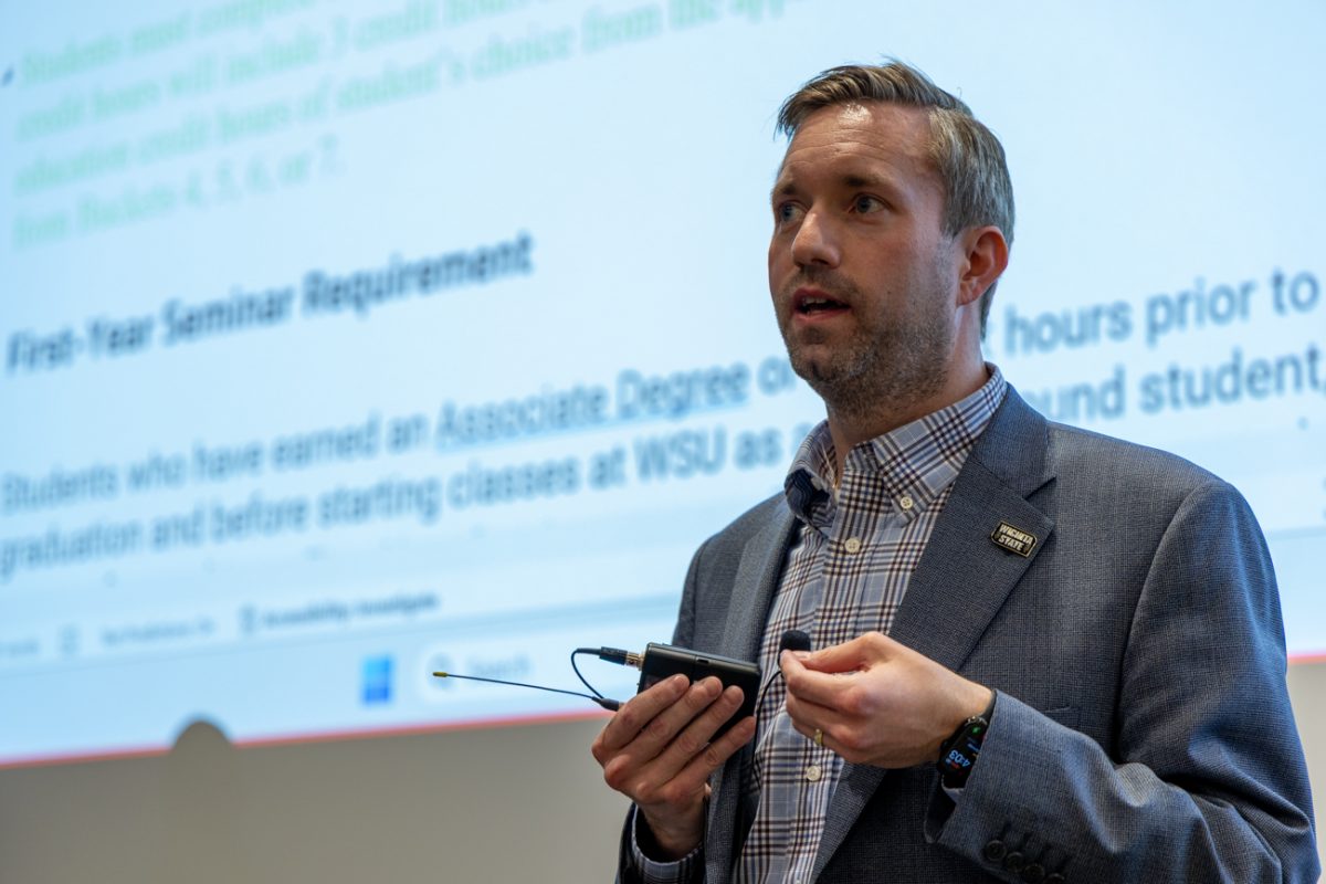 Wichita State Chief of Staff Zach Gearhart answers questions from the faculty senate meeting on March 30. Gearhart attended the meetings with the Kansas legislature on the new budget.