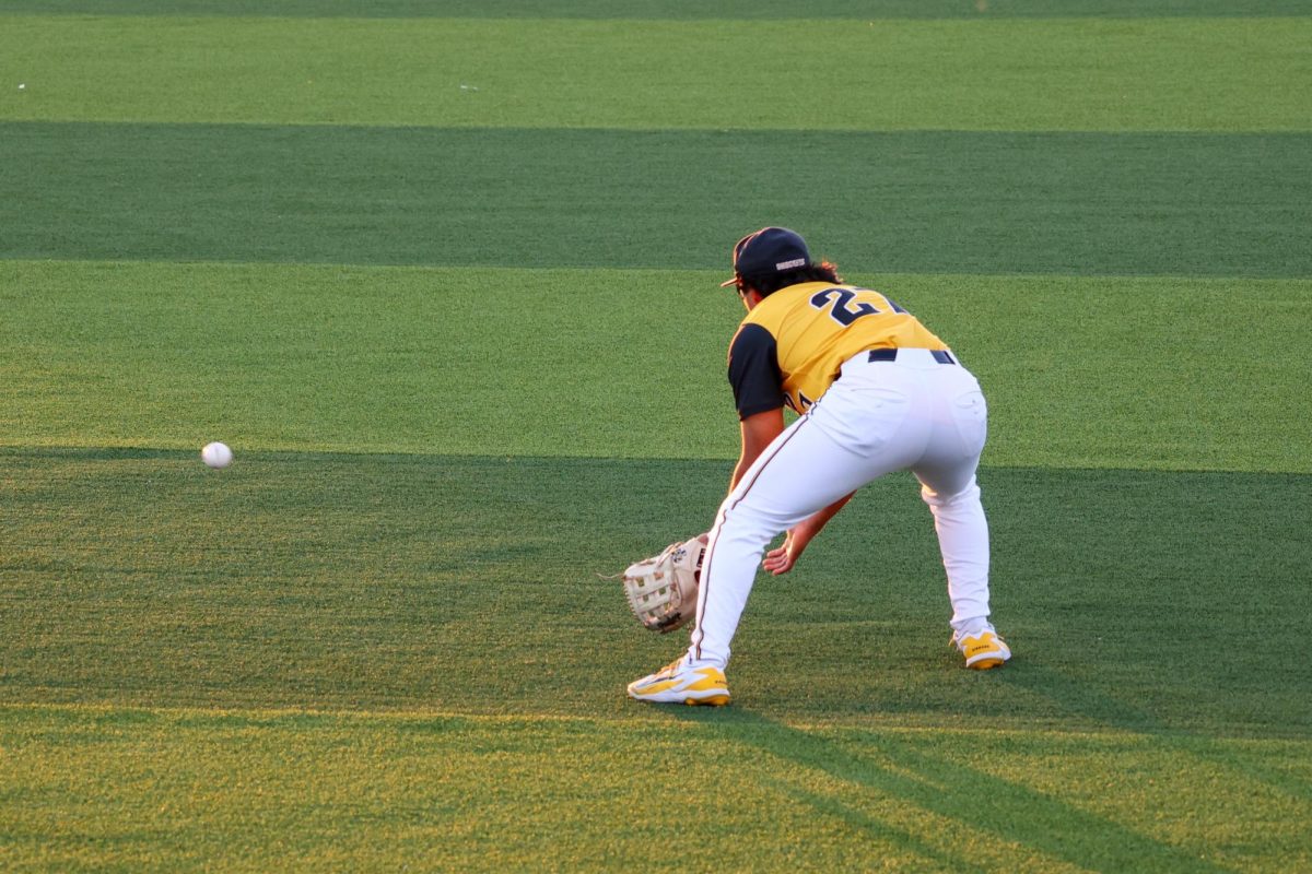 Wichita State baseball senior Jacob Gutierrez (27) fields a ball hit to right field against Tulane on April 2 at Eck Stadium. Gutierrez made two put outs in the Shockers' 4-2 loss.