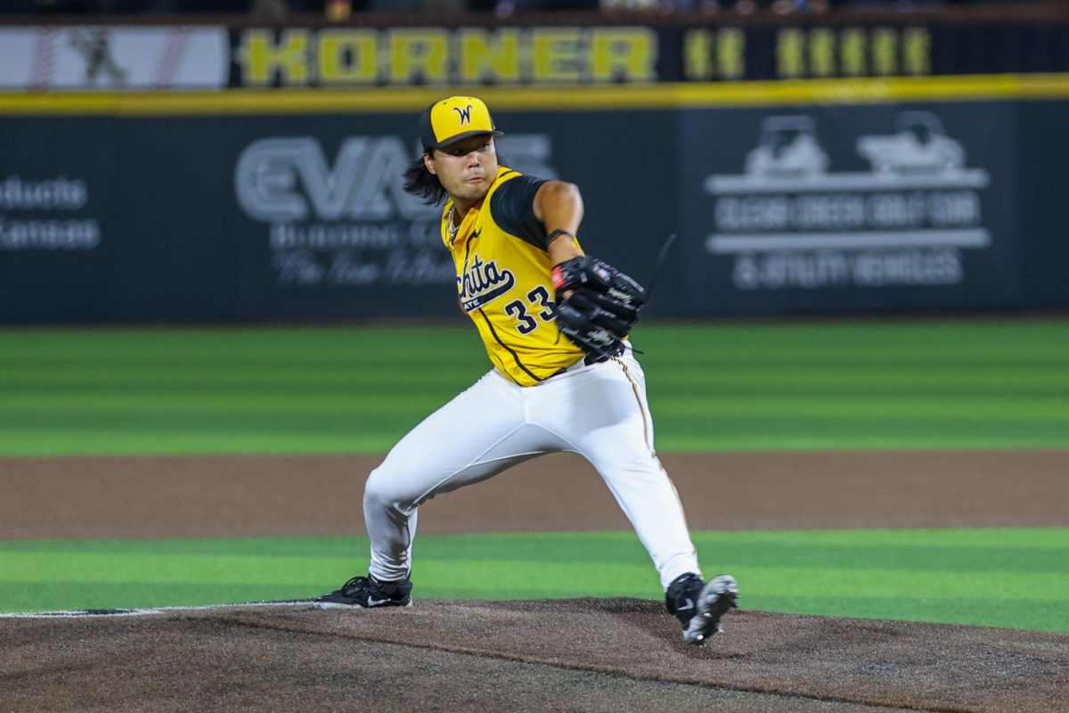 Wichita State senior Amar Tsengeg (33) winds up a pitch against Tulane on April 2 at Eck Stadium. (File photo)