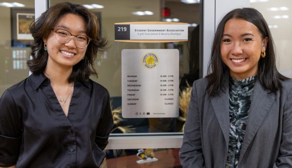 Former student body president Jia Wen and former student body vice president Amy Nguyen stand in front of the Student Government Association office. Wang and Nguyen served for the 68th session of SGA.