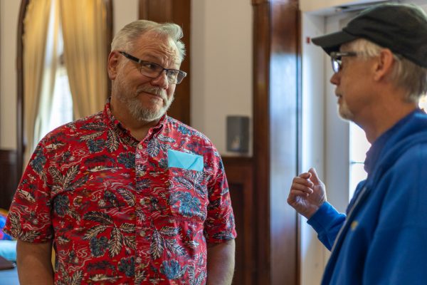 Associate Professor Ed Baker speaks with a friend at his retirement celebration. The celebration took place on May 6 in Wilner Auditorium from 2 p.m. to 3:30 p.m.