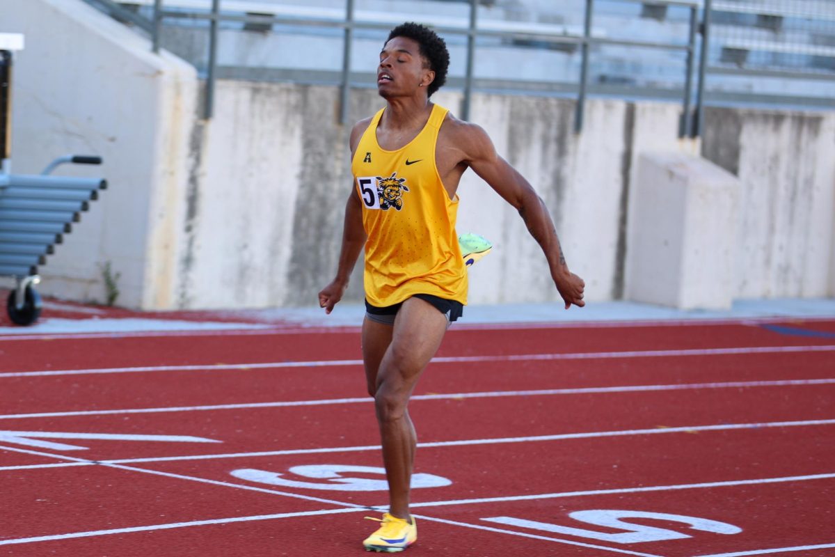 Wichita State track and field junior Jason Parrish crosses the finish line of the 400-meter hurdles at the Shocker Open on May 8 at University Stadium.  "I feel myself getting faster by the week," Parrish said.