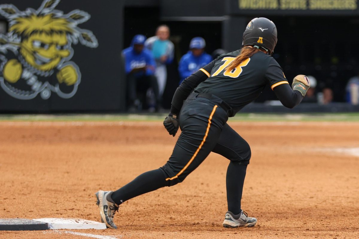 Wichita State softball sophomore catcher Aeryn Shuman (78) takes a slight lead-off at first base against Memphis on May 1 at Wilkins Stadium. Shuman collected one hit and a walk against the Tigers. 