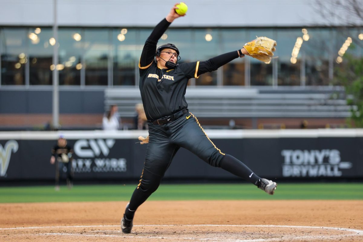 Wichita State softball sophomore pitcher Ava Sliger (5) winds up against Memphis on May 1 at Wilkins Stadium. Sliger threw 86 pitches and allowed two runs in the win.