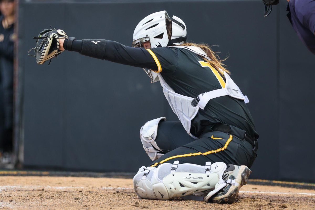 Wichita State softball sophomore catcher Aeryn Shuman (78) frames a pitch against Memphis on May 1 at Wilkins Stadium. Shuman's start was her 12th consecutive behind the plate.