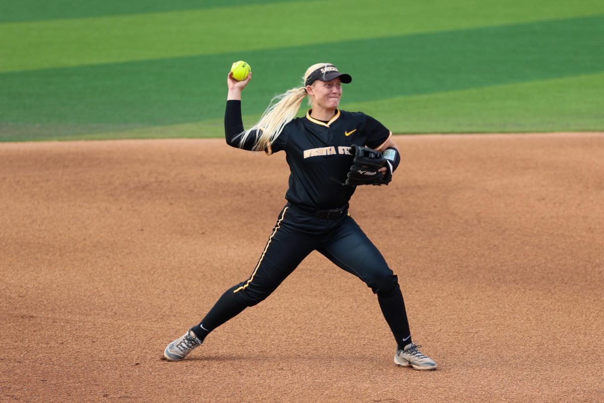 Freshman Kinzey Woody makes a throw from third base. Woody has a .985 fielding percentage this year.