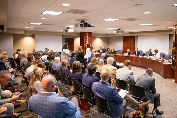 Students, faculty and administrators from multiple Kansas universities attend a Kansas Board of Regents meeting on May 20.