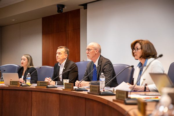 The Kansas Board of Regents listen to a presentation regarding the introduction of a reduced credit bachelor's degree on May 20.