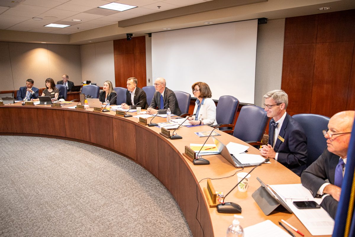 Regents from the Kansas Board of Regents listen to a presentation regarding the introduction of a reduced credit bachellor's degree on May 20.