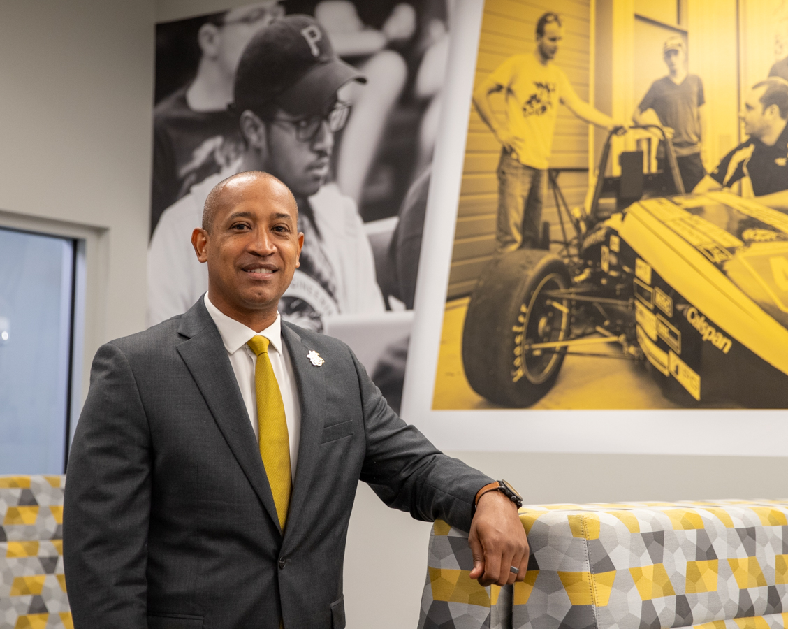 Dean of Engineering Ali Gordon stands in the student lounge in the Partnership 2 building on campus.